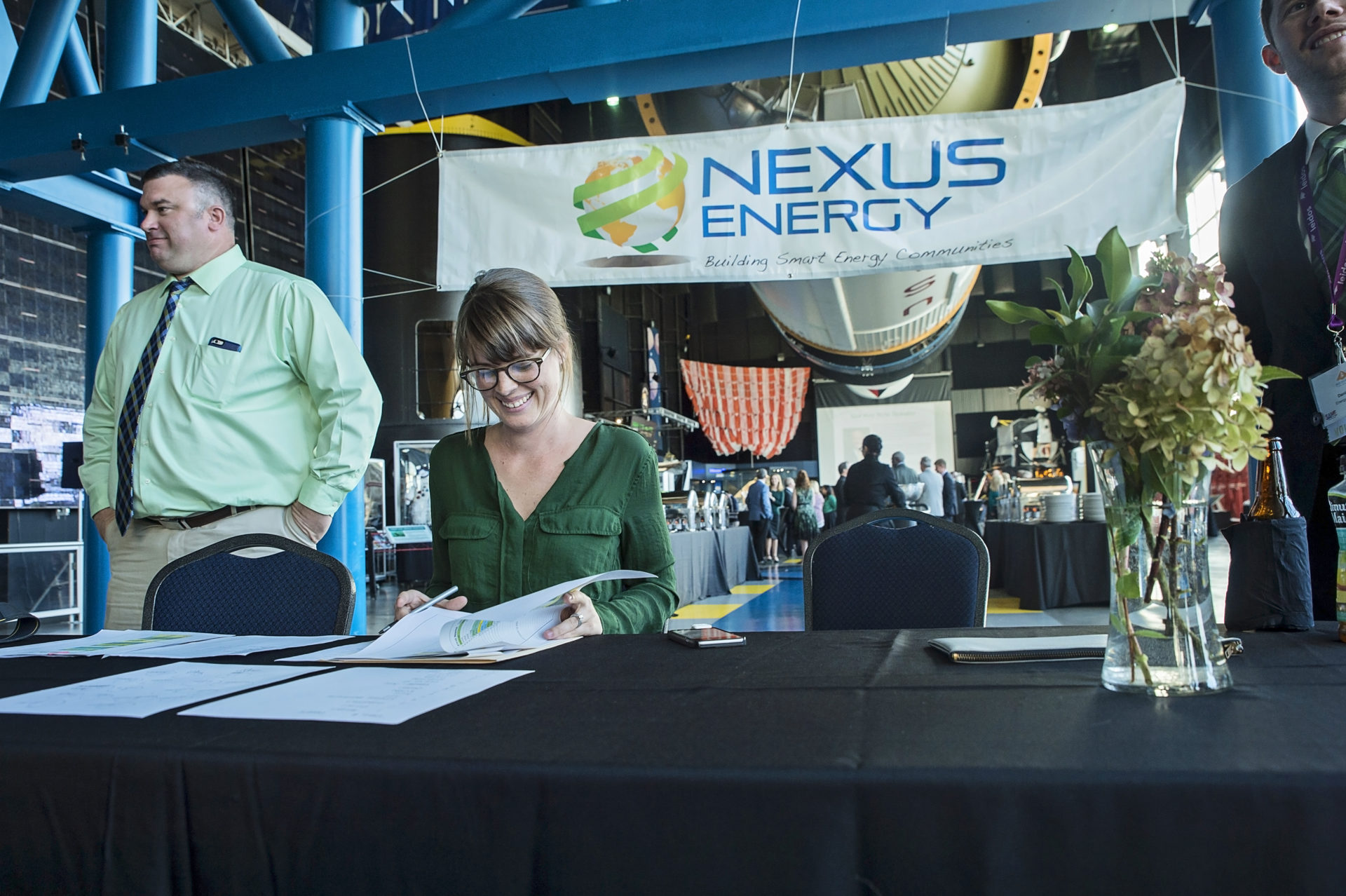 At the registration table with Joshlyne VIllano, Office Manager at Nexus Energy Center